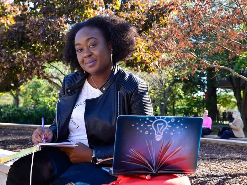 laptop, woman, POC, outside, portrait